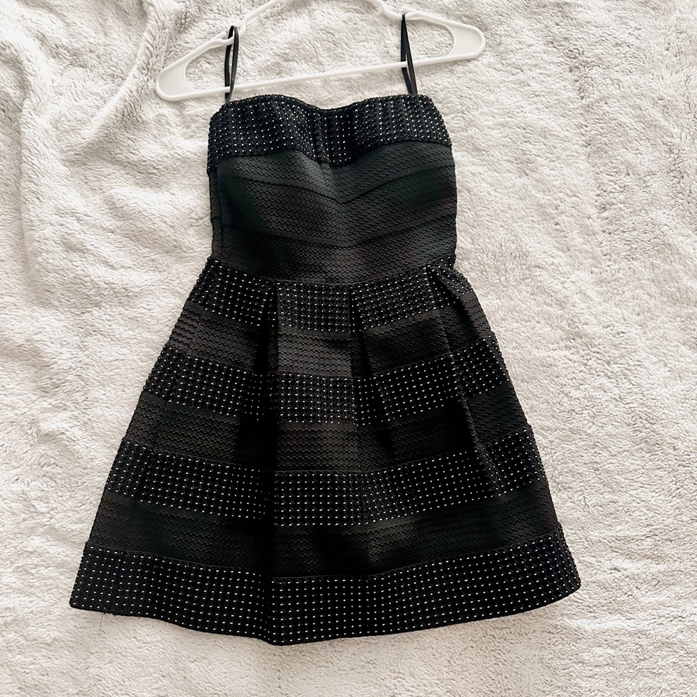 never worn before black (with sparkles) strapless dress.